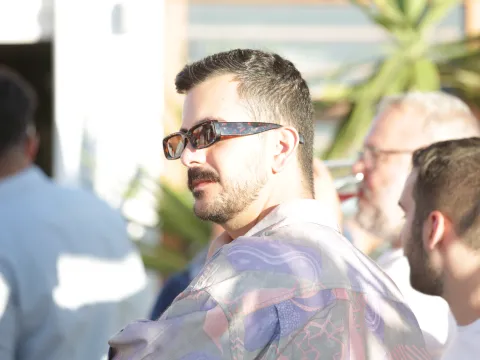 A profile photo of Alberto in sunglasses