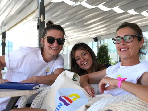 Sophie, Lara and Ana in the outdoor lobby of the hotel