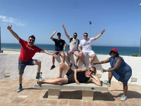 The "Dalia" team taking a group photo on the seafront promenade