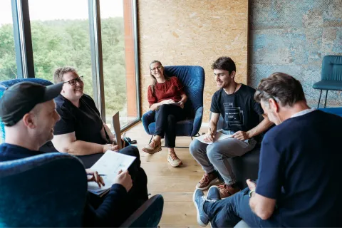 Our colleagues working in a small group